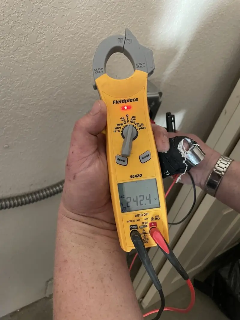 Voltage testing with clamp meter during Circuit Breaker Repair in Union City